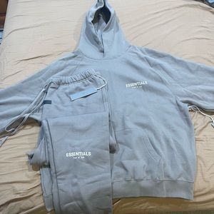 NEW ESSENTIALS! Never worn with tags! Has a decent oversized look to it.